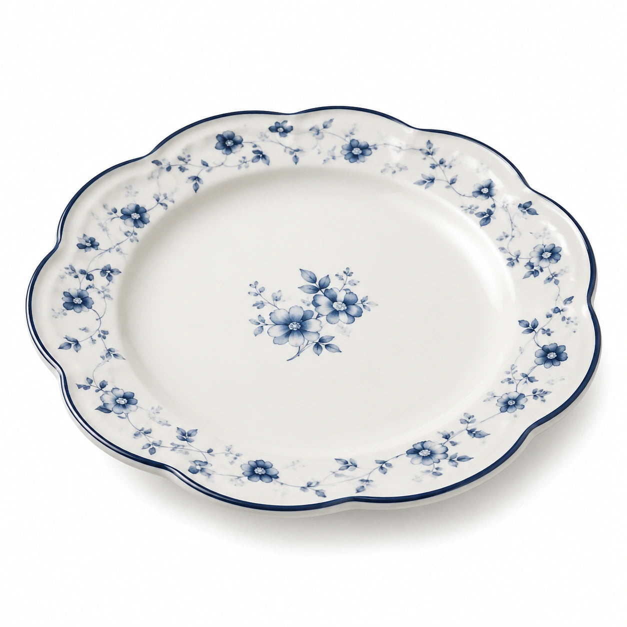 Assiette plate 26 cm en porcelaine blanche et bleue à motif floral bord festonné