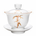 Bol à thé couvert 12 cm en porcelaine blanche décor bambou doré avec soucoupe